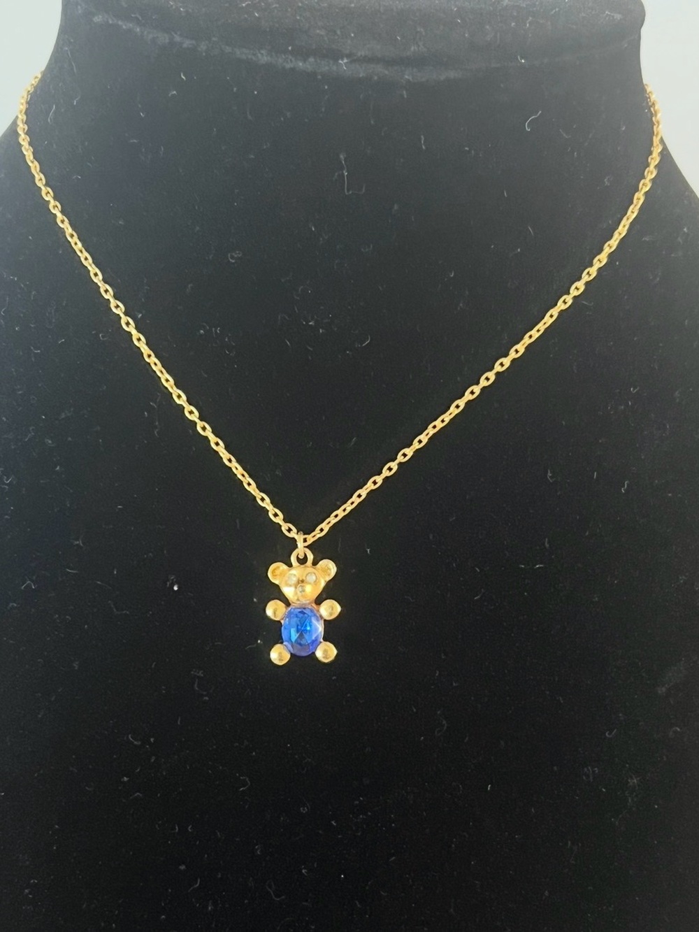 Gold Teddy Bear Necklace with Blue Gem Pendant